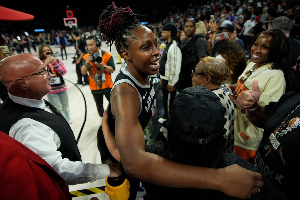 Las Vegas Aces guard Chelsea Gray leaves the court after Game 1 of the WNBA basketball finals against the Phoenix Mercury, Friday, Oct. 3, 2025, in Las Vegas. (AP Photo/John Locher)