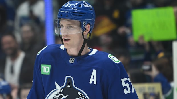 NHL fines Canucks defenceman Myers for slashing McDavid