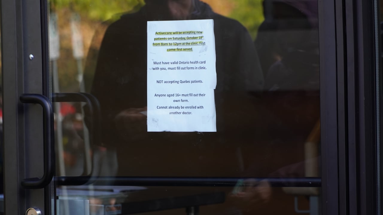 Paper posted on a door window.