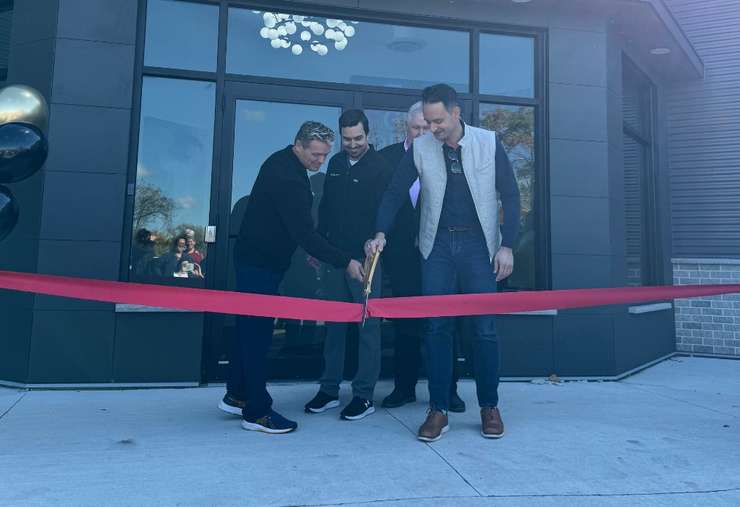 Doctors Jason Hall, Alan Poole and Mike Rondinelli snip the ribbon while St. Clair Township Mayor Jeff Agar looks on at the grand opening of the St. Clair Medical Centre in Corunna. October 21, 2025 Blackburn Media photo by Melanie Irwin.