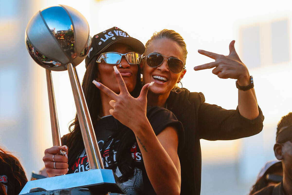 Aces center A'ja Wilson, left, poses with head coach becky Hammon during the Aces’ ...
