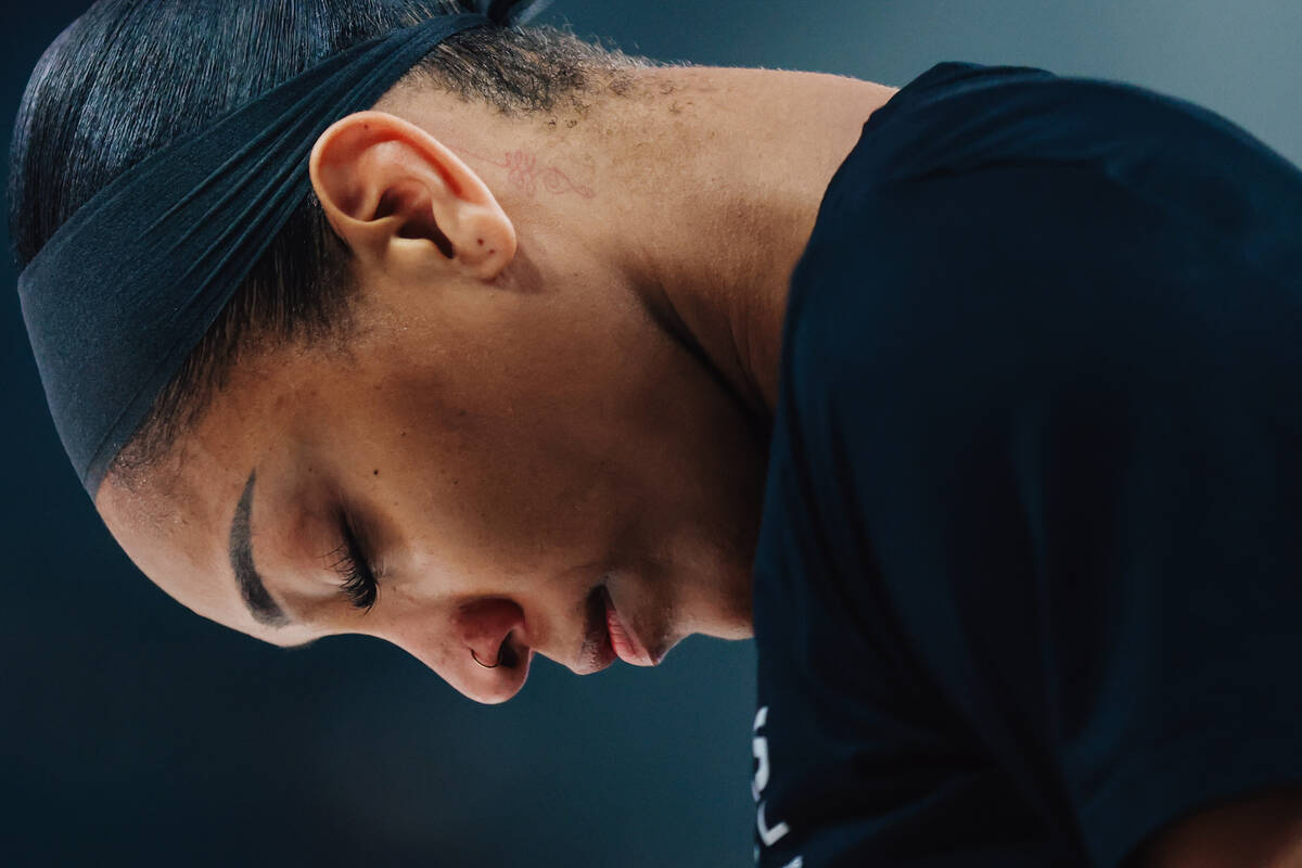 Aces center A'ja Wilson prays during warm ups for a WNBA basketball game between the Aces ...