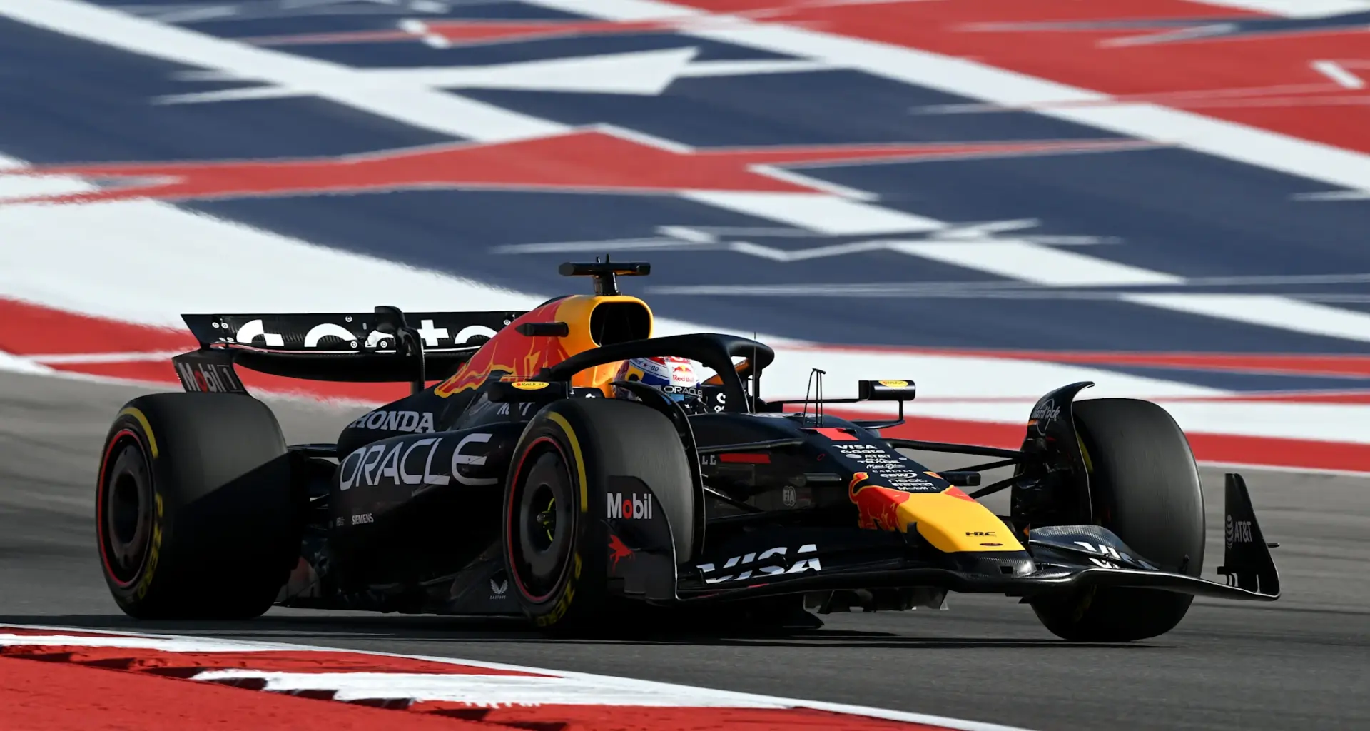AUSTIN, TEXAS - OCTOBER 16: Charles Leclerc of Monaco and Scuderia Ferrari arrives in the Paddock