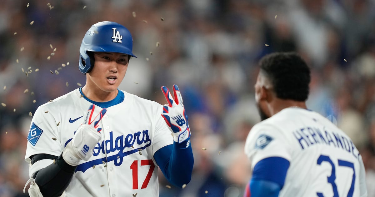 Shohei Ohtani, Teoscar Hernández power Los Angeles Dodgers past Cincinnati Reds in Wild Card Series opener