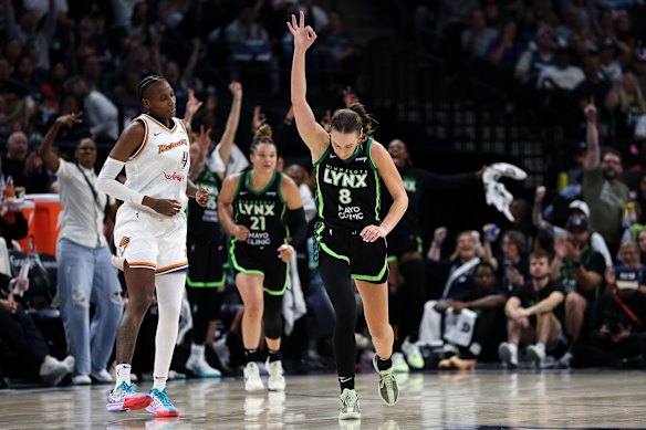Alanna Smith celebrates a three-point basket against the Phoenix Mercury during the playoff series.