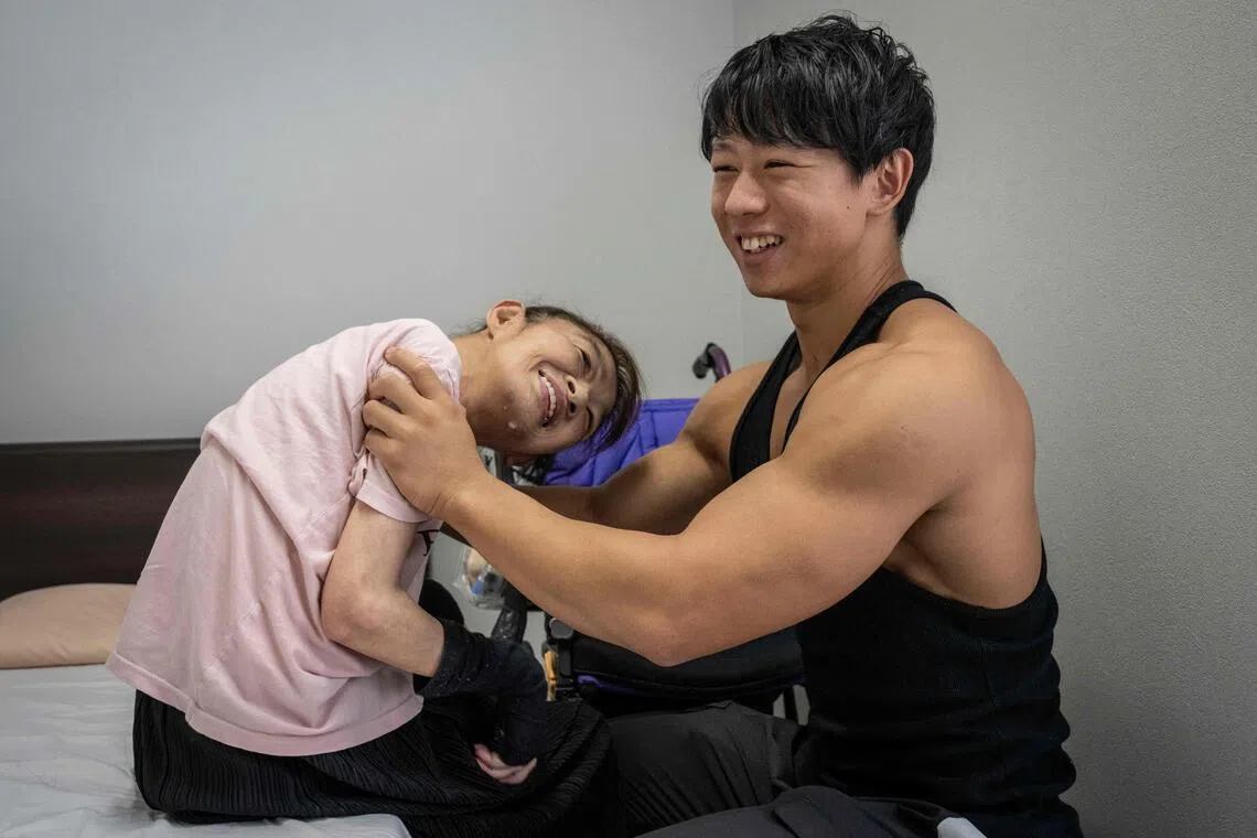 Young bodybuilders lift Japan’s ailing care sector
