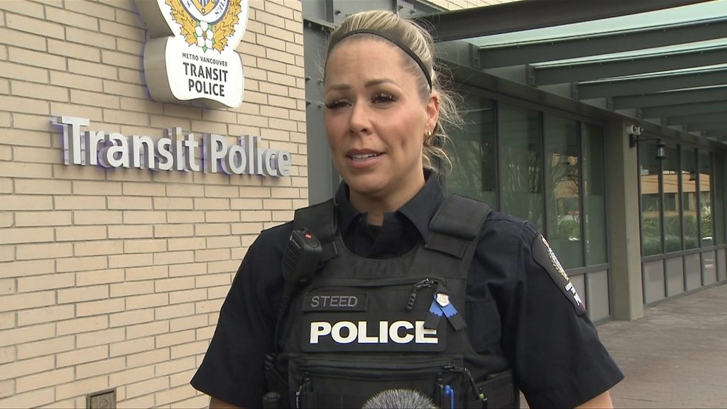 Constable amanda steed talks in front of the Metro Vancouver Transit Police station.