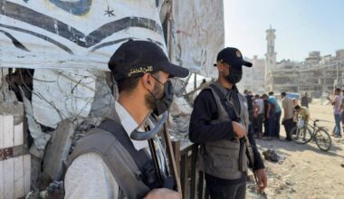 Hamas gunmen spotted on Gaza streets, in limited show of force as ceasefire sets in