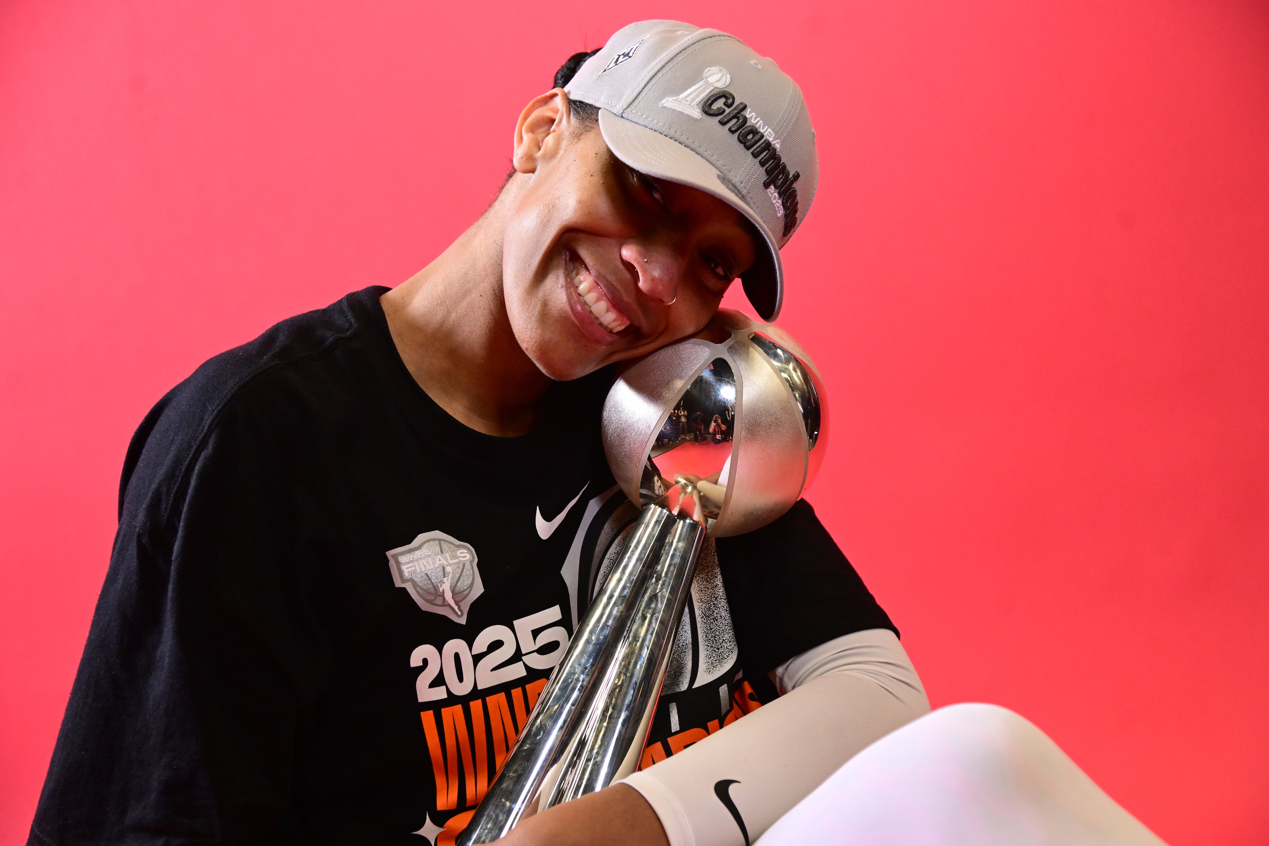 A'ja Wilson #22 of the Las Vegas Aces poses for a portrait with the 2025 WNBA Finals MVP Award trophy after winning the 2025 WNBA Championship 