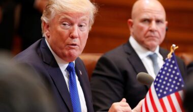 A mural depicting a skull version of Vladimir Putin, Russia's President, on a building adjacent to the Russian embassy, during an event to mark two years since the Russian invasion of Ukraine, in Riga, Latvia, on Feb. 24, 2024. (Andrey Rudakov/Bloomberg via Getty Images)