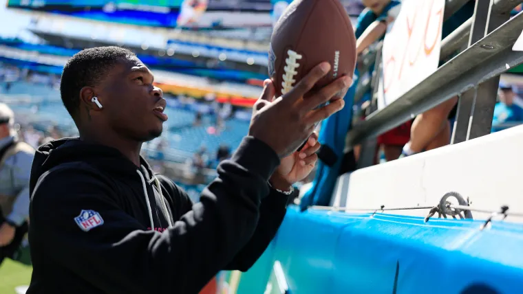 Travis Hunter on his first NFL touchdown, and the special person getting the ball image