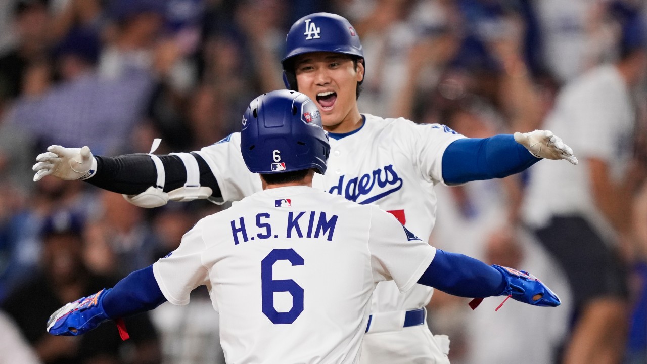 Dodgers eliminate Phillies after Kerkering's wild throw in extras