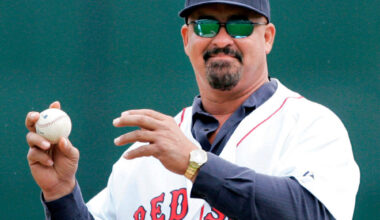 Former Boston Red Sox player Mike Greenwell sets to throw out the ceremonial first pitch prior to the Red Sox-New York Mets spring training baseball game in Fort Myers, Fla., Tuesday March 11, 2008. (Charles Krupa/AP)