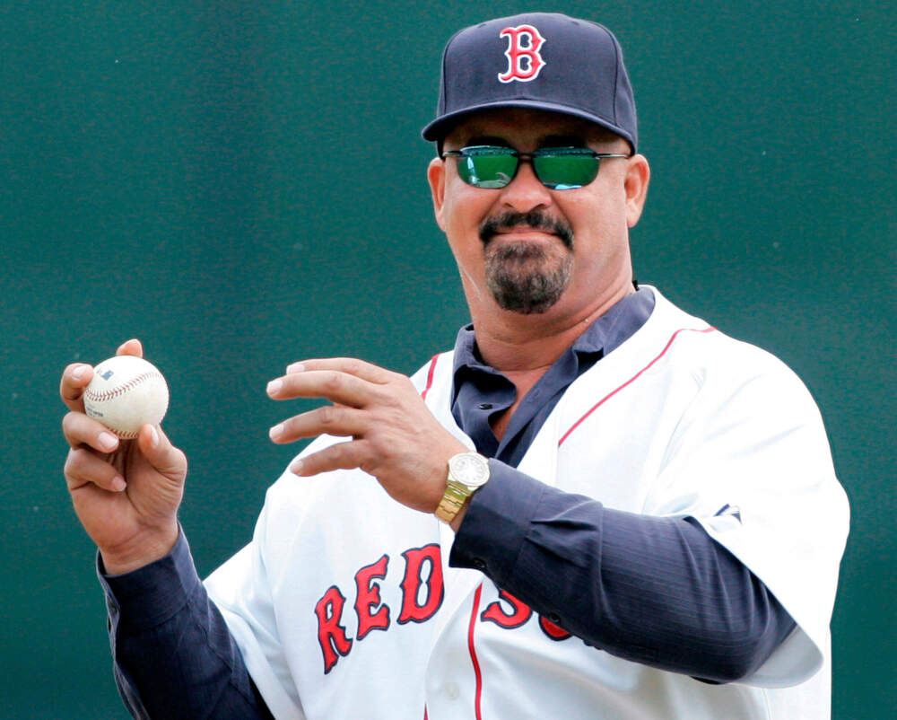 Former Boston Red Sox player Mike Greenwell sets to throw out the ceremonial first pitch prior to the Red Sox-New York Mets spring training baseball game in Fort Myers, Fla., Tuesday March 11, 2008. (Charles Krupa/AP)