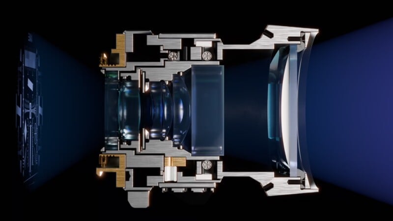 Cross-sectional view of a camera lens showing internal components, including glass elements and metal parts, illustrating how light passes through the lens to reach a sensor on the left side.