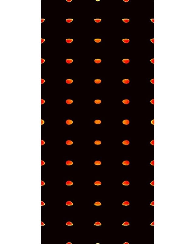 A black background with evenly spaced rows of small, glowing orange-red oval shapes, forming a symmetrical, grid-like pattern.