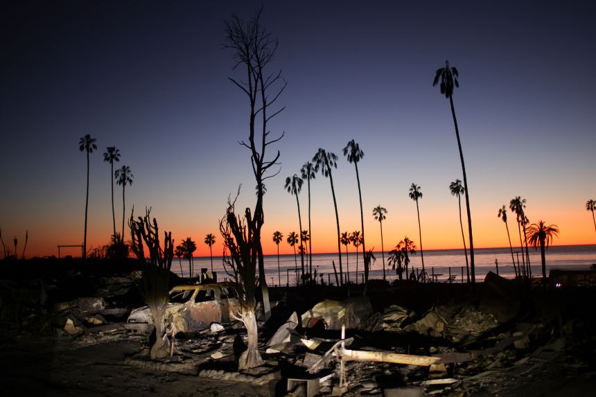 The devastation of the Palisades Fire is seen at sunset in the Pacific Palisades neighborhood of Los Angeles on January 14.