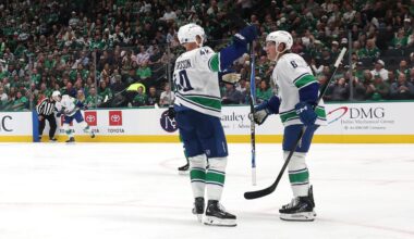 Canucks score 4 goals in 2nd period, rally past Stars