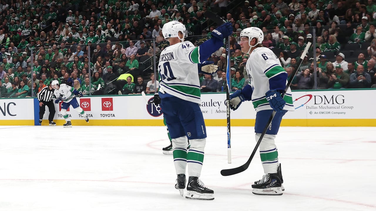 Canucks score 4 goals in 2nd period, rally past Stars