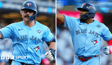 Toronto Blue Jays batters Davis Schneider and Vladimir Guerrero Jr celebrate hitting their first-inning home runs