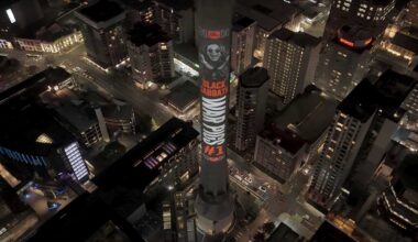 Sky Tower in Auckland with a projection of Ozzy Osbourne
