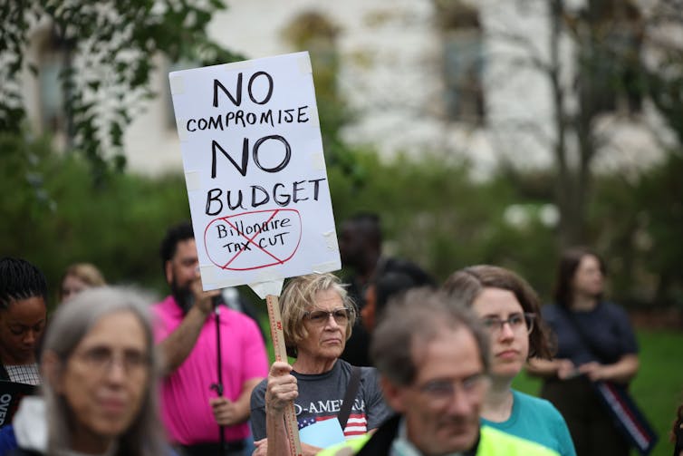 Protesters on September 30, 2025, at a rally against cuts to health care