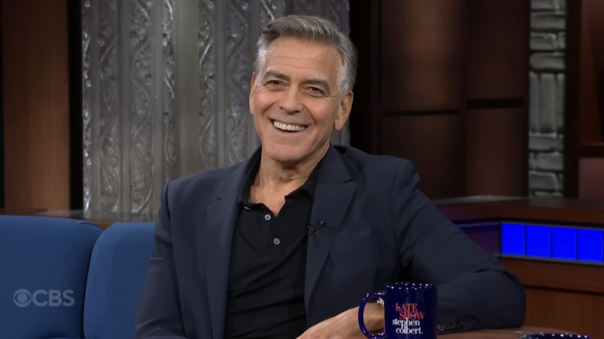 George Clooney is "very proud" of the Louvre robbers