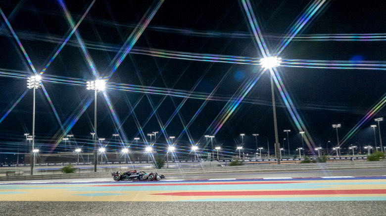 Lewis Hamilton at full song in the Mercedes W15 under the lights at Lusail International Circuit
