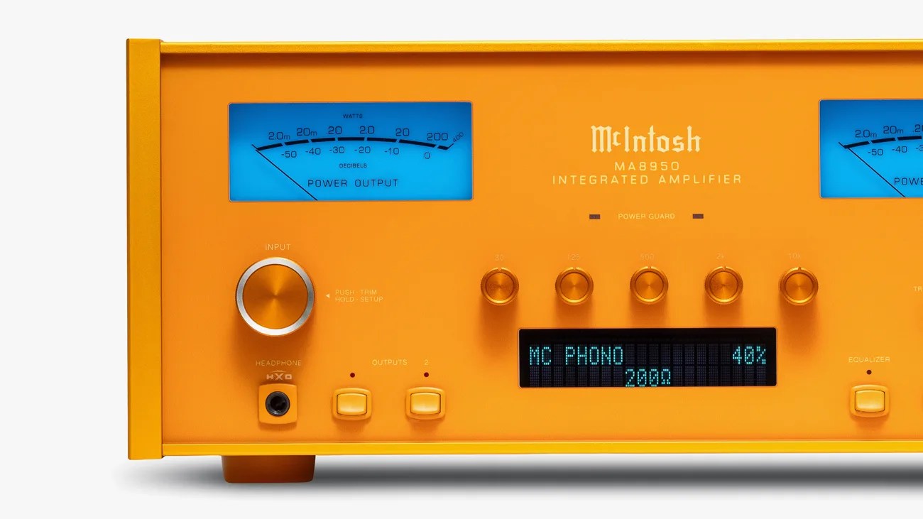 Orange McIntosh MA8950 integrated amplifier with blue power output meters and digital display showing