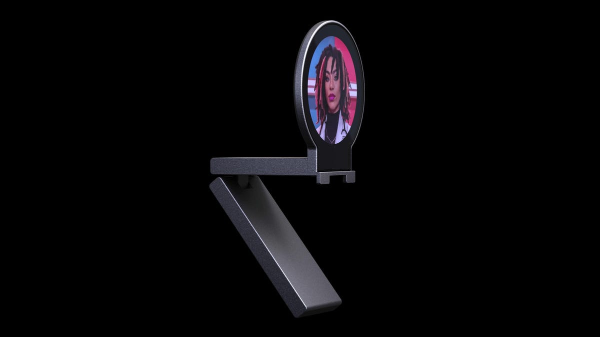 Napster View hardware device. The screen shows an AI-generated image of a young black woman.
