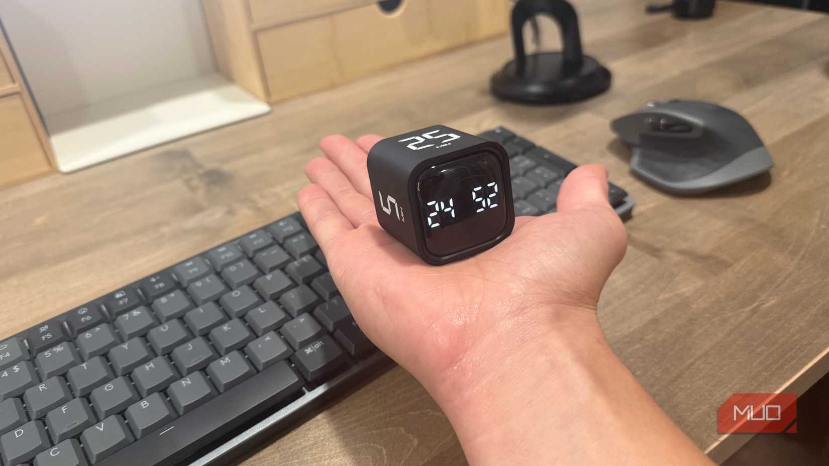 pomodoro timer cube on hand