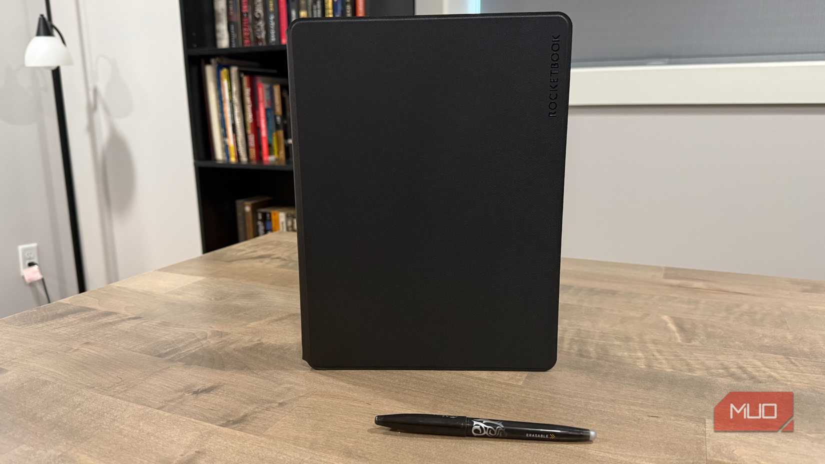 rocketbook pro standing on desk with pen in front