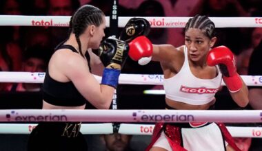 Puerto Rico's Amanda Serrano, right, punches Ireland's Katie Taylor during the second round of a super lightweight championship boxing match Friday, July 11, 2025, in New York. (AP Photo/Frank Franklin II)