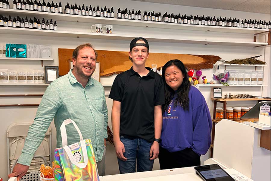 Toby Hayes, left, with his son, Micah, center, and soon to be daughter-in-law at Modern Hippie in Rigby.