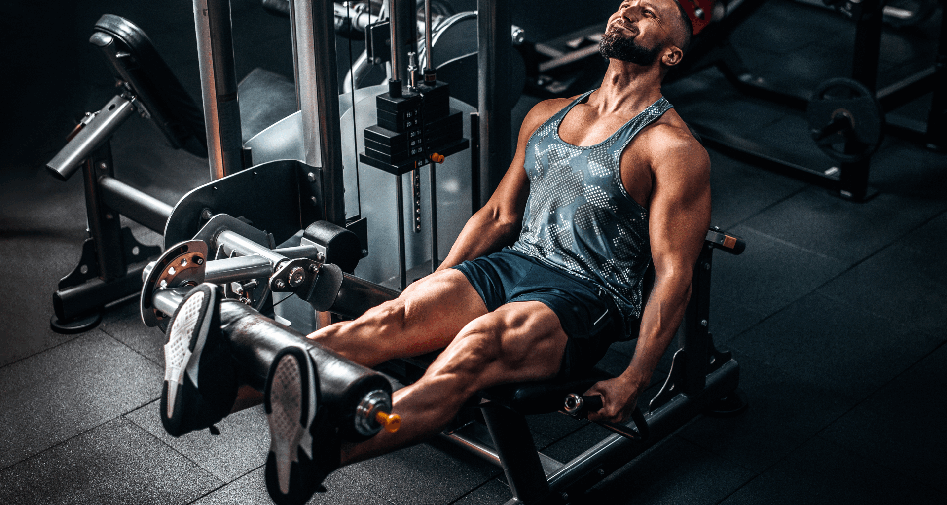 A man on the leg extension machine