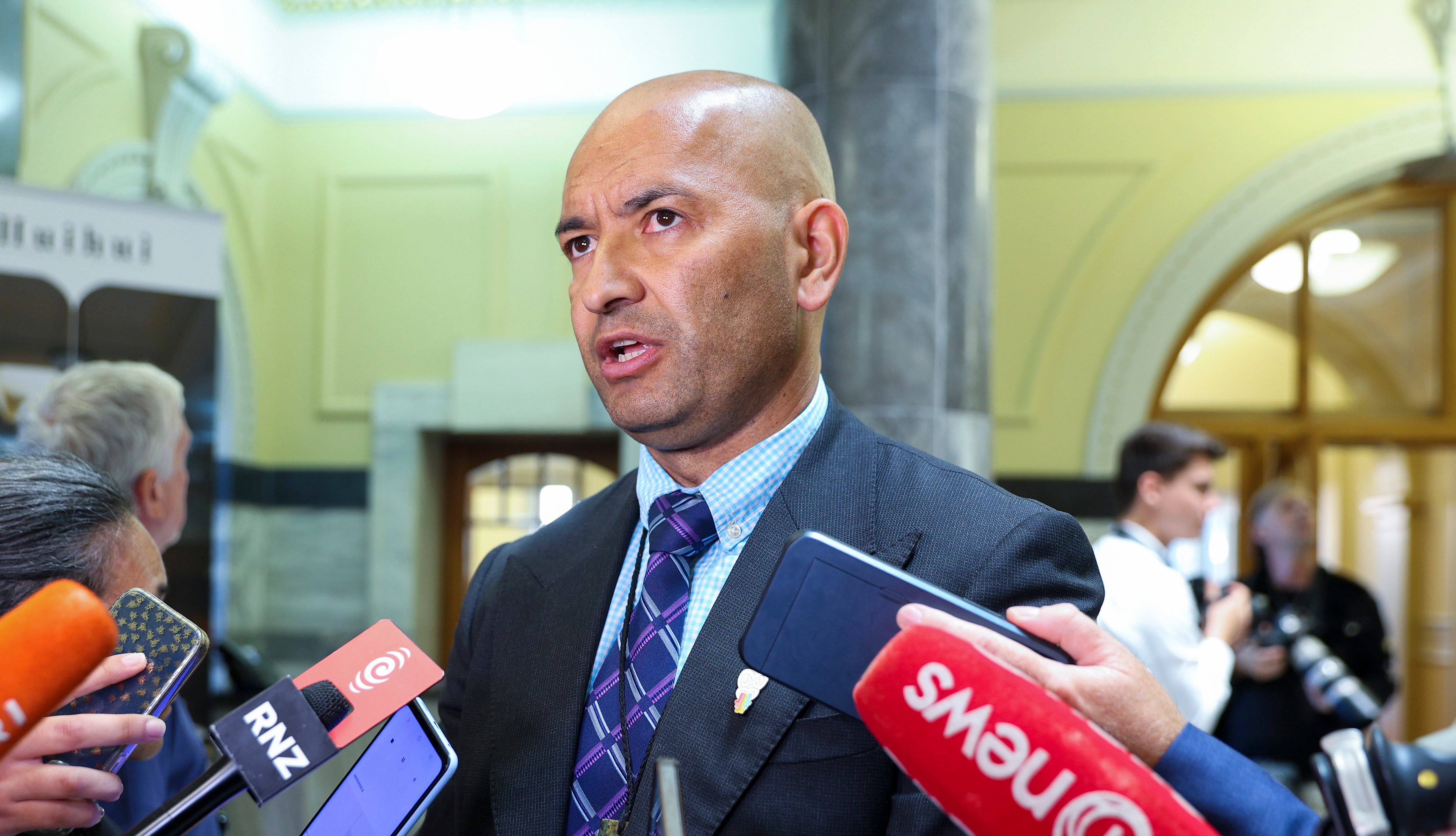 Minister Tama Potaka speaks to media at Parliament.