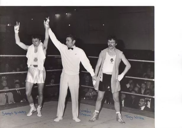 Ernie Lawrence raises the arm of George Gilbody after victory over Tony Willis at Liverpool Stadium, year unknown