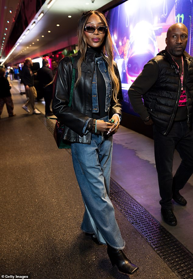 Supermodel Naomi Campbell, 55, made a rare fashion misstep this weekend by layering up with a double denim ensemble before adding yet another jacket in leather to match her black square toe heeled boots