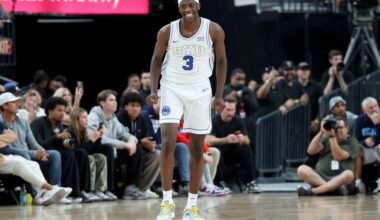 BYU forward AJ Dybantsa smiles after a play during the second half of an NCAA college basketball game against Villanova, Monday, Nov. 3, 2025, in Las Vegas. (AP Photo/Ian Maule)