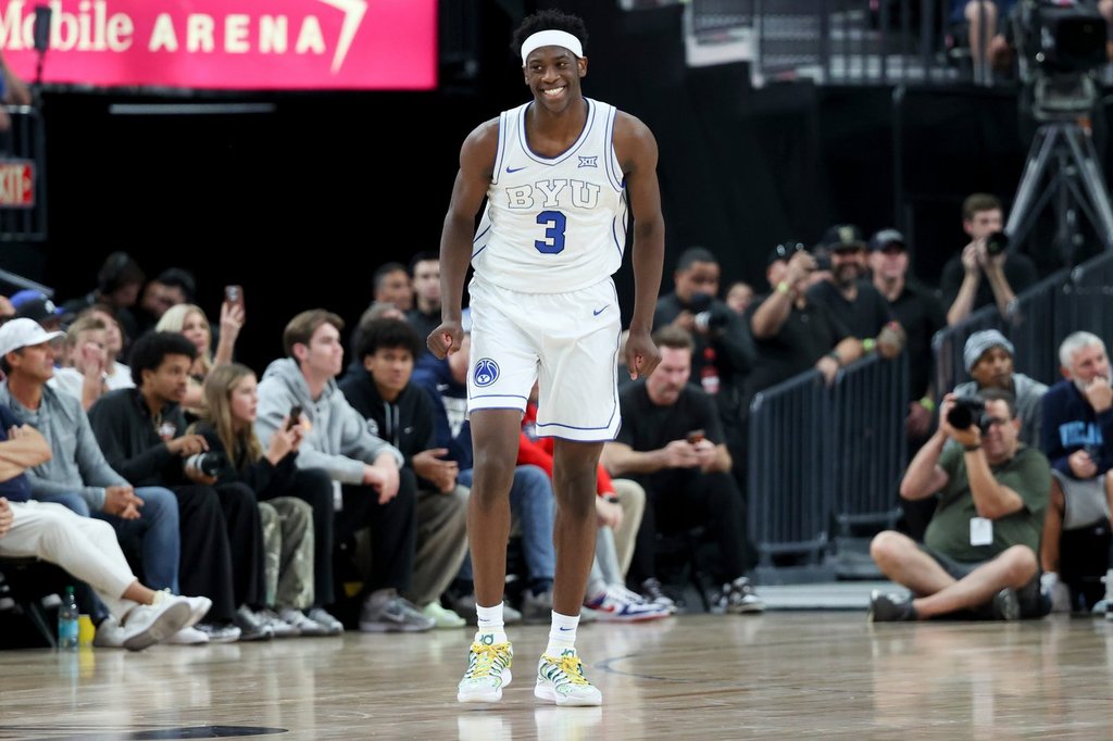 BYU forward AJ Dybantsa smiles after a play during the second half of an NCAA college basketball game against Villanova, Monday, Nov. 3, 2025, in Las Vegas. (AP Photo/Ian Maule)