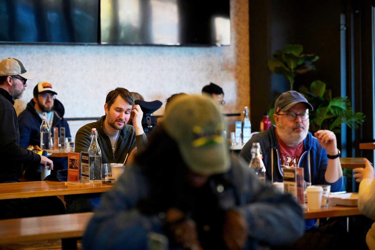 People are seen dining in a restaurant.