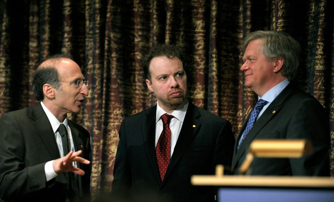 The 2011 Nobel Prize laureates in physics (from left) Saul Perlmutter, Adam Riess and Brian P. Schmidt chat during a news conference at The Royal Swedish Academy of Sciences in Stockholm in December 2011.