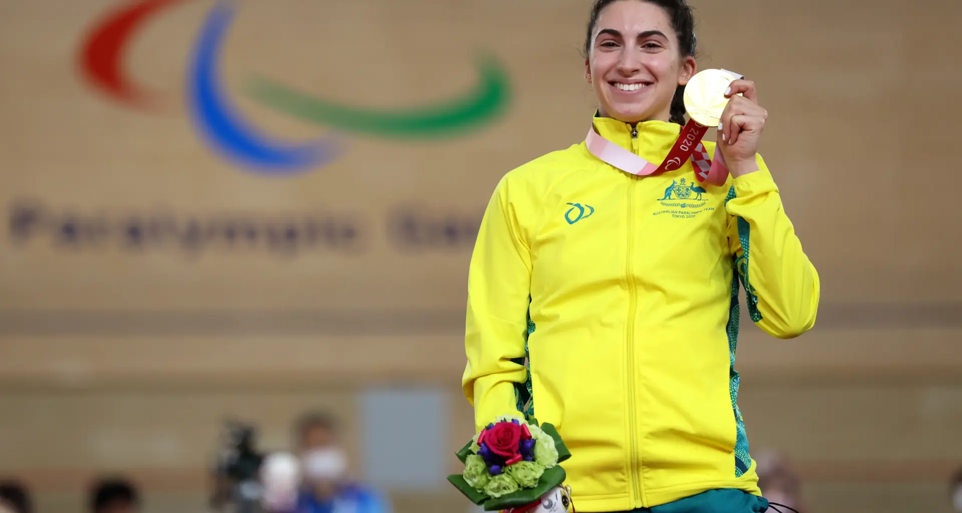 Paige Greco initially tried running before she started cycling (Image via Getty)
