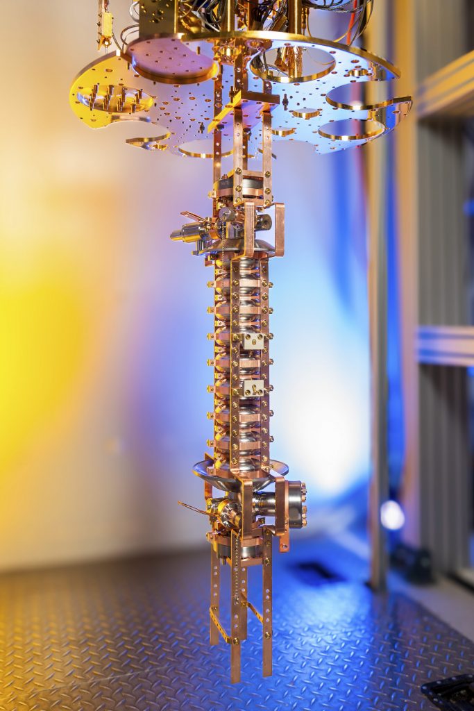 A prototype nine-cell SRF cavity-qubit system