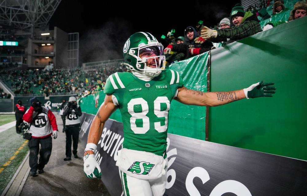 Heywood Yu / THE CANADIAN PRESS
Saskatchewan Roughriders’ Kian Schaffer-Baker celebrates after scoring a touchdown in the Western final.