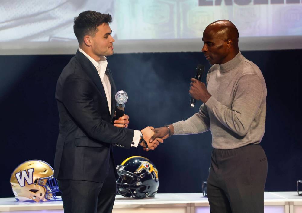 John Woods / THE CANADIAN PRESS
Nathan Rourke (left) is congratulated by Milt Stegall after being named the CFL’s Most Oustanding Player.