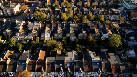 Shutterstock An aerial view of about 100 houses