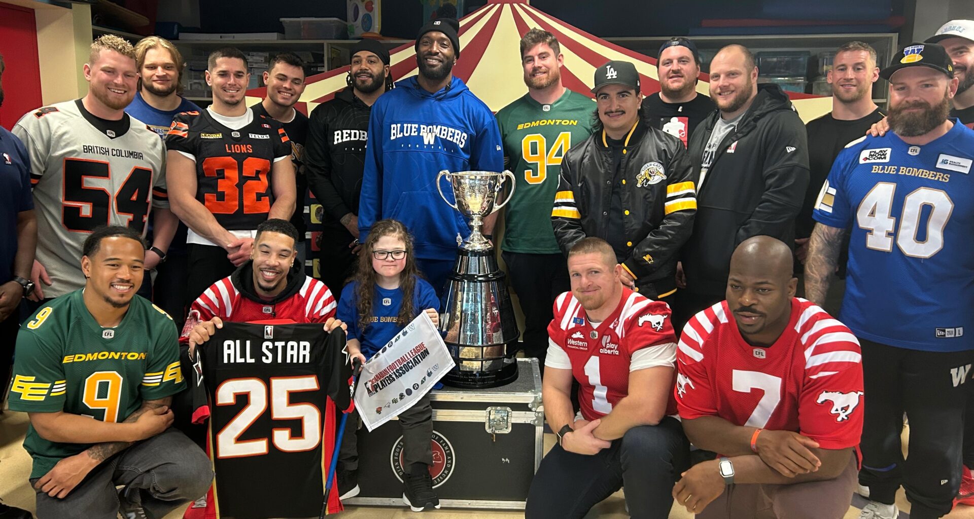 Sick kids at HSC get surprise Grey Cup visit from CFL players