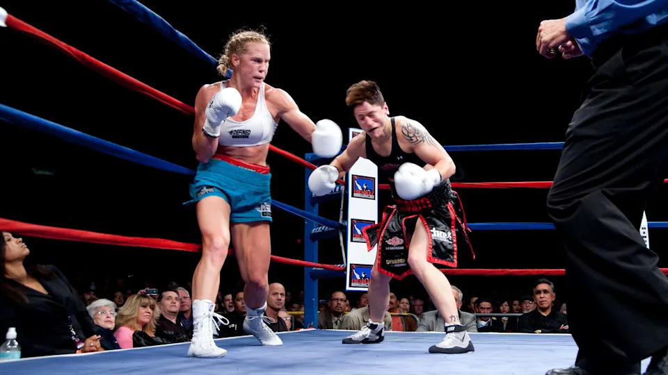 ALBUQUERQUE, NM � DECEMBER 3: IBA World Champion Holly Holm (l) battles with #1 Ranked Challenger Ann Marie Saccurato for the IBA Jr. Welterweight World Title at Route 66 Casino�s Legends Theater on December 3, 2010 in Albuquerque, New Mexico.The event was presented by Fresquez Productions, Inc. in Albuquerque.  (Photo by Steve Snowden/Getty Images)