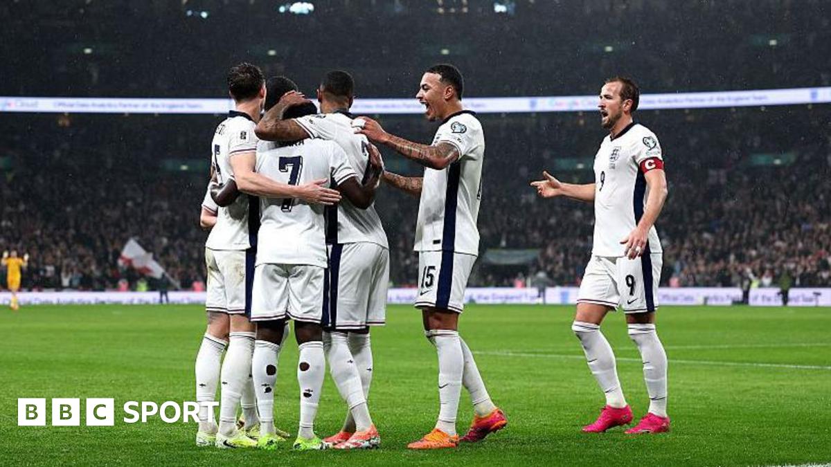 The England players celebrate together after Bukayo Saka's goal.